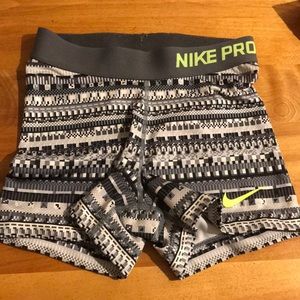 white and black nike pros